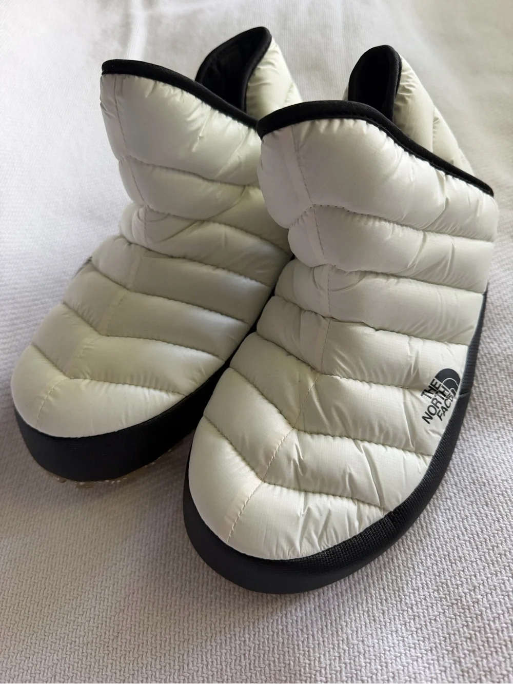 The North Face White and Black Quilted Slip-On Winter Booties